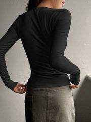 T-shirt med långa ärmar med halv knapp för kvinnor