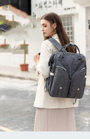 Bärbar hopfällbar mumieväska för spjälsäng