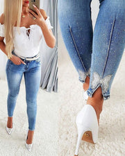 Jeans för kvinnor Europeiska och amerikanska trendiga hög midja pärlstav skinny tappered byxor